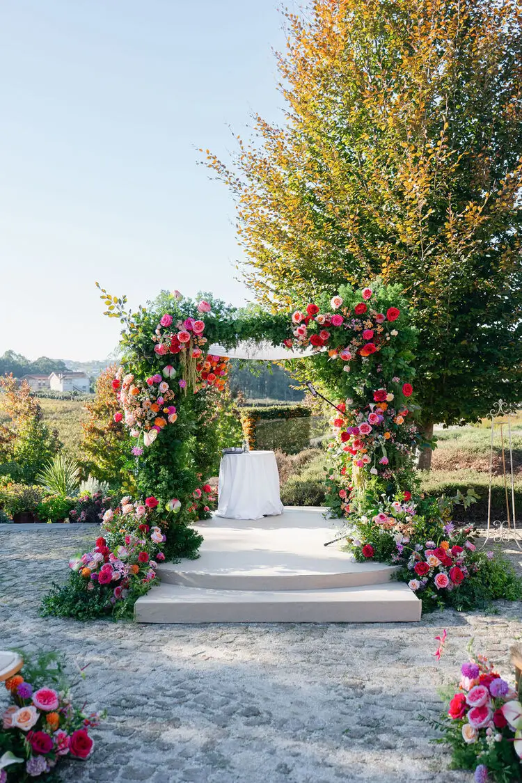 wedding-ceremony-aisle-floral-arch-monverde-hotel